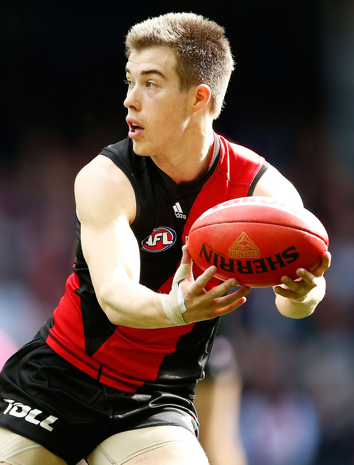 AFL 2016 Rd 21 - Essendon v Gold Coast MELBOURNE, AUSTRALIA - AUGUST 14: Acting captain Zach Merrett of the Bombers in action during the 2016 AFL Round 21 match between the Essendon Bombers and the Gold Coast Suns at Etihad Stadium on August 14, 2016 in Melbourne, Australia. (Photo by Adam Trafford/AFL Media)
